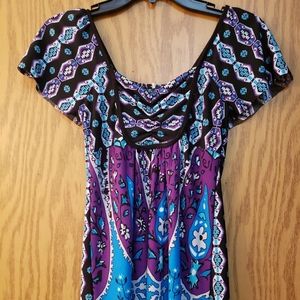 Beautiful tunic blouse in blue, purple and black tribal design. Size small